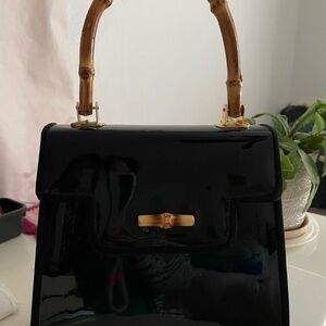 Elegant Black Patent Leather Handbag with Bamboo Handles